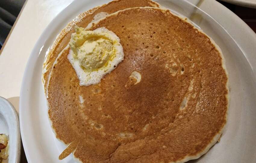 fluffy pancakes topped with butter from beechwold diner