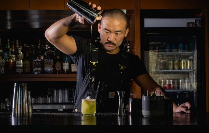 bartender pouring drink at Cobra