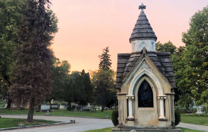 a mausoleum at sunset