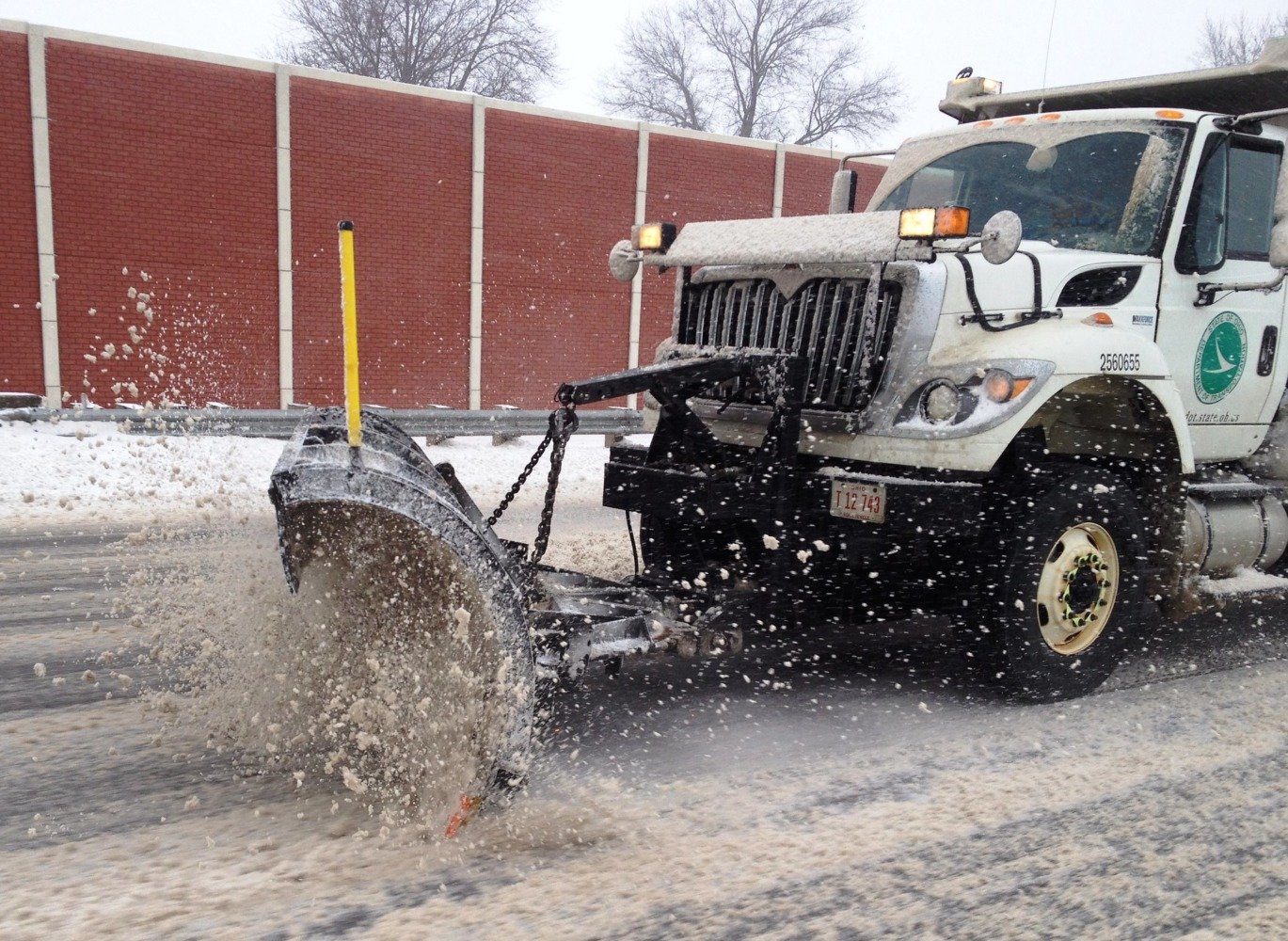snow plow clearing snow