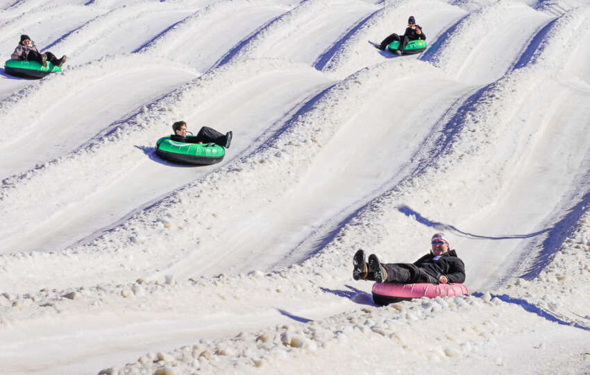 people tubing at mad river mountain