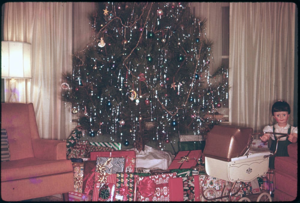 presents around a christmas tree 1950s
